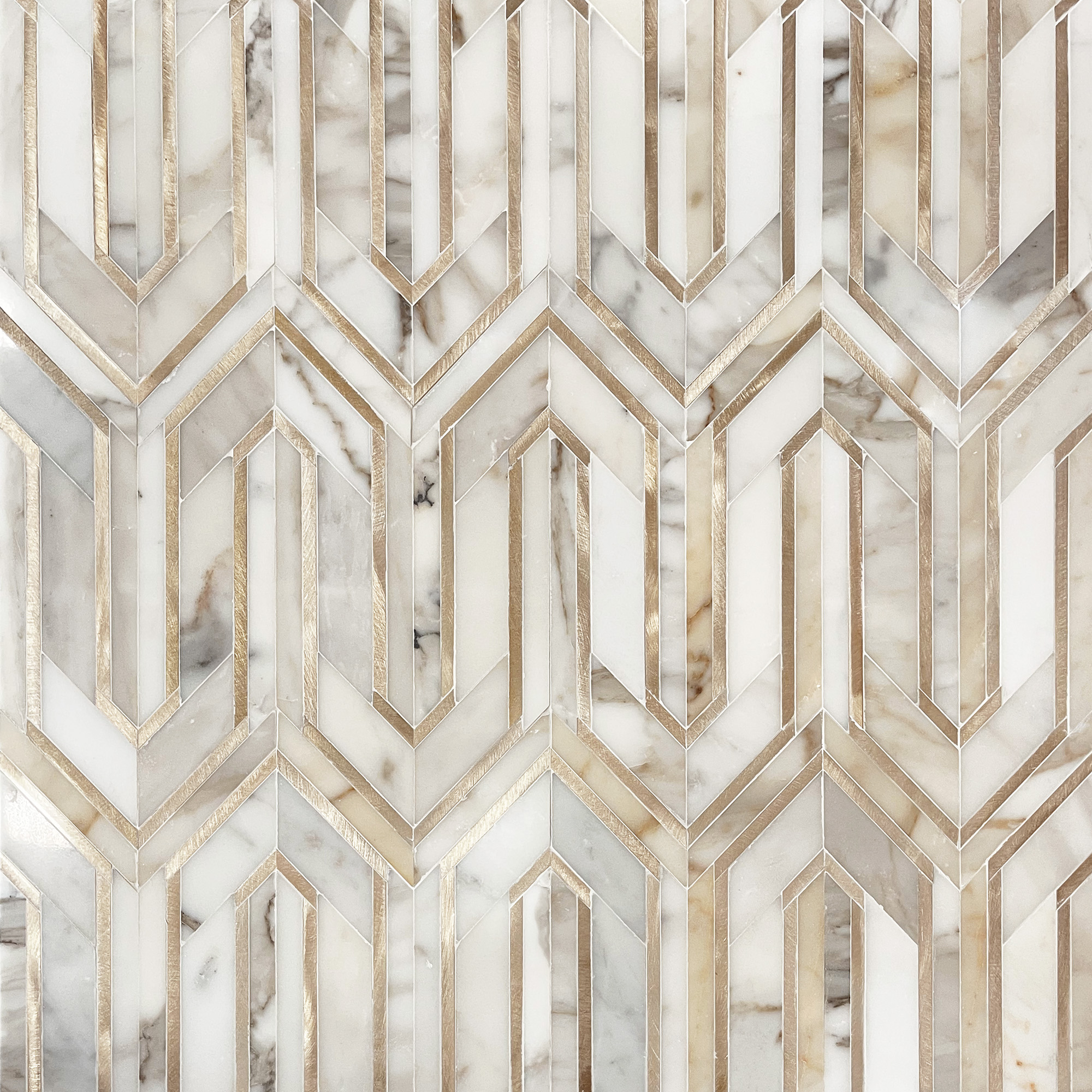 Calacatta Gold with Golden Metal Waterjet Arrow 